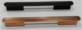 Two decorative cabinet pulls shown on a plain light background: a matte black pull at the top and a copper-toned pull at the bottom.